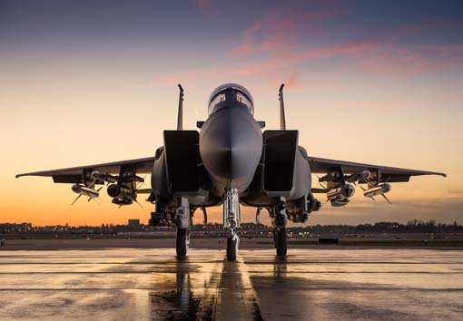 F-15 Aircraft #2 on Tarmac at Sunset with Weapons.