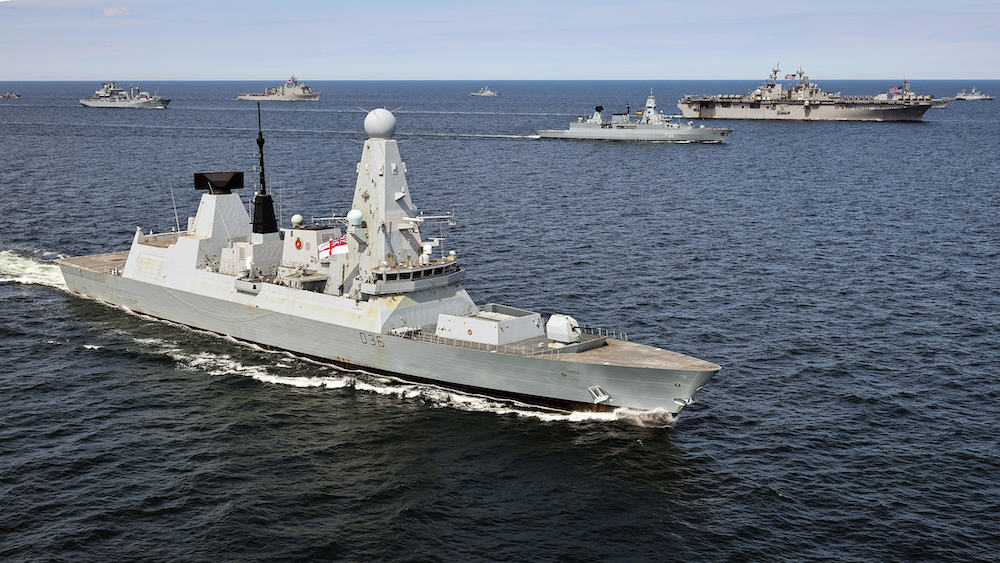 Photo shows Ships from Denmark, Finland, Germany, Lithuania, Poland, Sweden, the United Kingdom, and the United States sail in formation in the Baltic Sea, during exercise BALTOPS22. (Courtesy Photo from NATO)