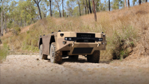 Ten-Tonne Hybrid UGV Adapts Bushmaster Mobility for Autonomous Logistics
